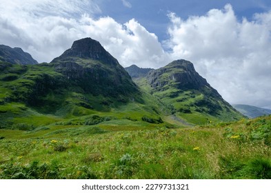 Beautiful landscape with Glencoe or Glen Coe mountains. An beautiful view over landscape in the Scottish Higlands, Scotland. UK. View of the Hidden-valley in the Scottish Highlands.
