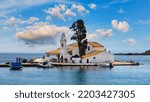 Beautiful landscape with Holy Monastery of Panagia Vlacherna of the coast Ionian Sea in the Corfu or Kerkyra is a Greek island, Europe. Monastery of Panagia Vlacherna in Corfu island, Ionian, Greece