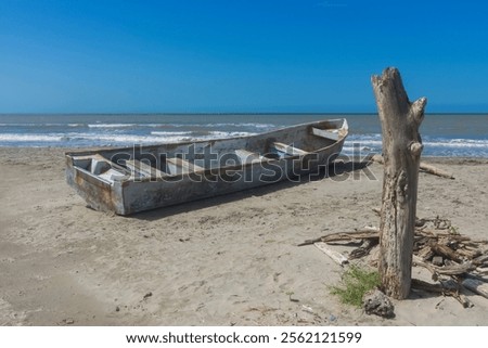 Similar – Image, Stock Photo Typical beach on the Atlantic coast of Belgium during daylight hours. A place of relaxation and rest. Spending your free time