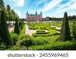 beautiful landscape with magical incredible gardens and park Frederiksborg slot Castle near Copenhagen. Hillerod, Denmark. Exotic amazing places. Popular tourist atraction.