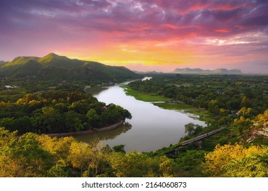 The beautiful landscape in the morning of the Kwai Noi River curve and the mountains at the Golden Chedi Viewpoint Wat Tham Khao Pun, Kanchanaburi. - Shutterstock ID 2164060873