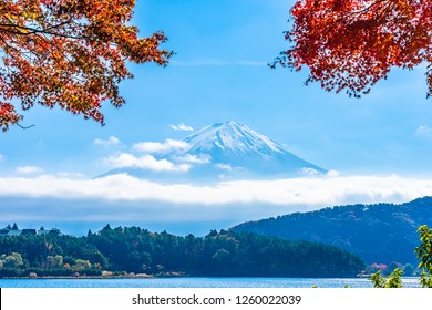 Beautiful landscape of mountain fuji with maple leaf tree around lake in autumn season