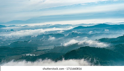 Beautiful Landscape of mountain layer in morning sun ray and winter fog at Doi Sa Ngo mountain in Chiang Saen district of Chiang Rai province of Thailand - Shutterstock ID 1711660816