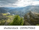 Beautiful landscape with mountains, valley and a river on a sunny summer day with clouds. Dagestan.