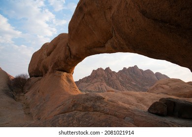 Beautiful Landscape With A Natural Stone Arch In Damaraland, Namibia. No People.Africa