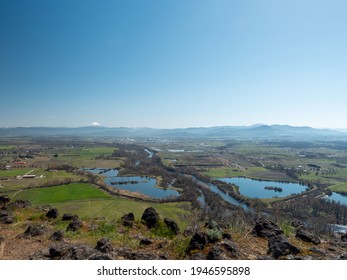 Beautiful Landscape With Negative Space At Top. Photo Of The Rogue River Valley On Sunny Spring Day With The Volcano Mt. McLoughlin In The Background From Lower Table Rock Near Medford, Oregon.