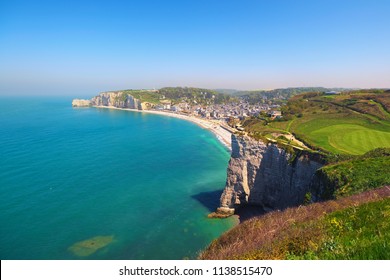 Beautiful landscape on the cliff, city of Etretat and the English Channel in sunny spring day. Etretat, Seine-Maritime department, Normandy, France. - Shutterstock ID 1138515470