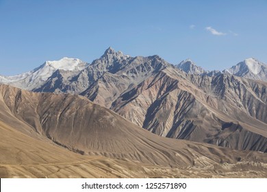 Beautiful landscape in the Pamir mountains. View from Tajikistan towards Afghanistan in the background with the mountain peaks