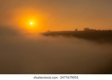 Beautiful landscape photo with mysterious dense fog. Morning with fog. - Powered by Shutterstock