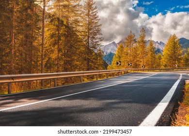 Beautiful landscape with roadway. Highway in mountains in autumn day in Italy, empty asphalt road. Dolomites, Alps  - Shutterstock ID 2199473457
