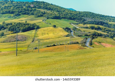 Beautiful landscape, spring nature. View from above of sunny fields on rolling hills in Tuscany, Italy - Shutterstock ID 1465593389