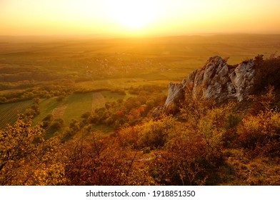Beautiful landscape with steep limestone rocks on the hillside of Table Mountain in Pálava Protected Landscape Area in Czech republic at sunset
