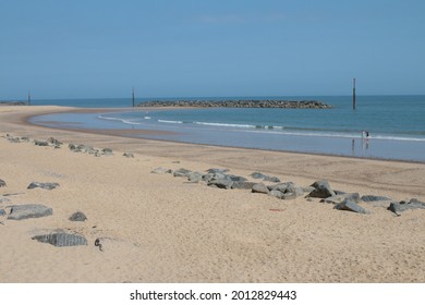 Beautiful Landscape Of Stunning Sandy Vast Beach In Sea Paalling Bay In Norfolk East Anglia Uk With Blue Skies In Summer Sun And Calm Tide Ocean  No People