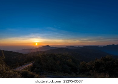 Beautiful landscape of the sunrise viewpoint which is the highest mountain of Thailand in the morning of the winter season at Doi Inthanon National Park, Chiang Mai, Northern Thailand.