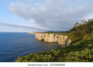 beautiful landscape at sunset of the coast and cliffs in Asturias, Spain. Hell Cliffs Trail ( acantilados del infierno ) - Powered by Shutterstock