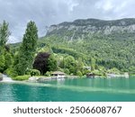 Beautiful landscape of the Swiss mountains and the lake in Merligen in Switzerland.