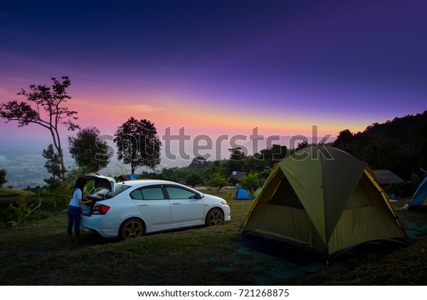 Beautiful landscape ; tourist tent at sunset in\
Northern part of Thailand and Adventure travel active lifestyle\
freedom outdoors.