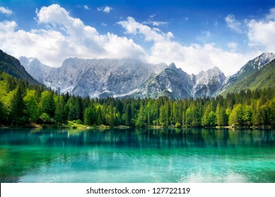 Beautiful landscape with turquoise lake, forest and mountains - Powered by Shutterstock