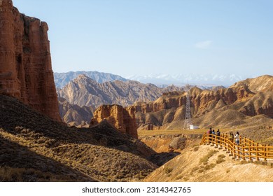 Beautiful landscape of typical landform at Binggou Danxia Scenic Area, Zhangye, Gansu, China. Martian red rocks, blue sky with copy space for text