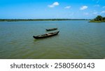 Beautiful landscape view of Bharathapuzha, Small boats in Kerala river, Fishing boat in blue sky, Canoes on the banks of Nila, traditional fishing boats, backwaters, Ponani Karma road, Ponnani