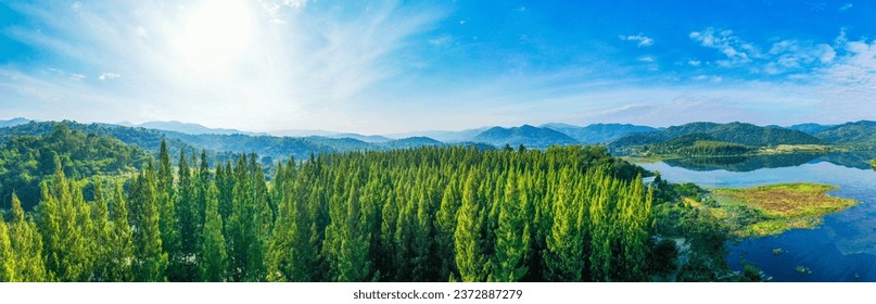 Beautiful landscape view of green summer forest with spruce and pine trees mountain, lake, river. Adventure travel nature background. Ecosystem ecology healthy environment. - Powered by Shutterstock