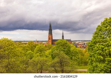 Beautiful landscape view of towers of Uppsala Cathedral Church on cloudy sky background. Sweden.