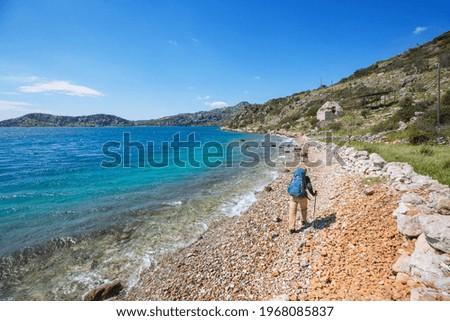 Similar – Trail in a beautiful landscape