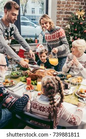 Beautiful Large Family Having Christmas Dinner Together