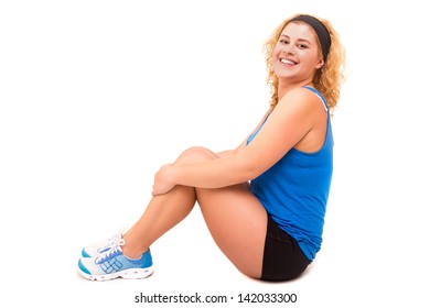 Beautiful Large Woman Exercising - Isolated Over A White Background