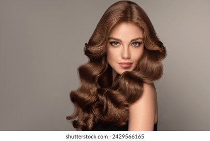 Beautiful laughing brunette model  girl  with long curly  hair . Smiling  woman hairstyle wavy curls . Red  nails manicure .    Fashion , beauty and makeup portrait
 - Powered by Shutterstock