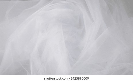 Beautiful layers of delicate light white fabric background.