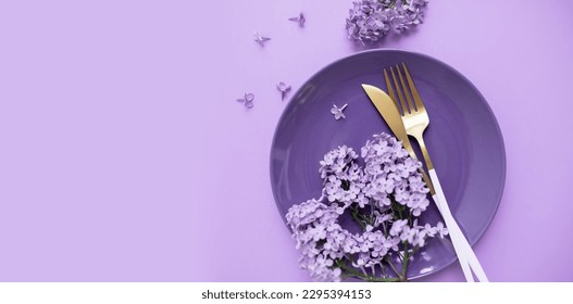 
beautiful layout with lilacs, a plate and cutlery on a purple background. place for text. spring food concept for restaurant or cafe. - Powered by Shutterstock