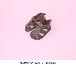 Beautiful Leather Kids Shoes On а Pink Background. Close Up. Children's Concept.