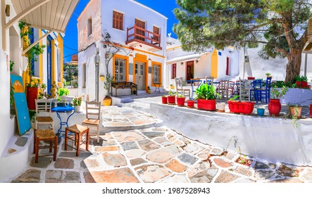 Beautiful Lefkes traditional greek village in Paros island. Charming coffe bars and taverns in colorful narrow streets. Cyclades , Greece - Shutterstock ID 1987528943