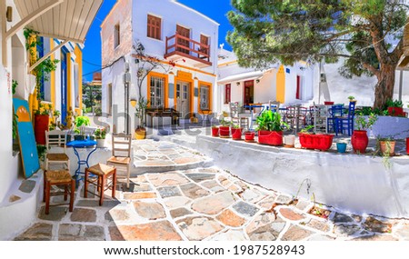Beautiful Lefkes traditional greek village in Paros island. Charming coffe bars and taverns in colorful narrow streets. Cyclades , Greece Foto d'archivio © 