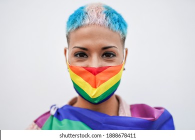 Beautiful Lesbian Woman With LGBT Pride Rainbow Face Mask Outdoor - Portrait Of Homosexual Girl At Gay Pride Parade