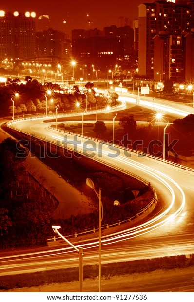 beautiful light trail at
the busy highway
