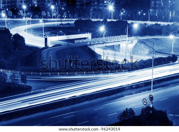 beautiful light trail at\
the busy highway