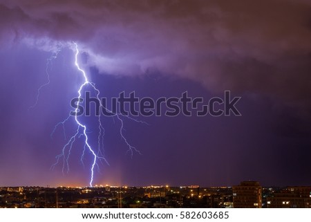 Beautiful lightning above the night city