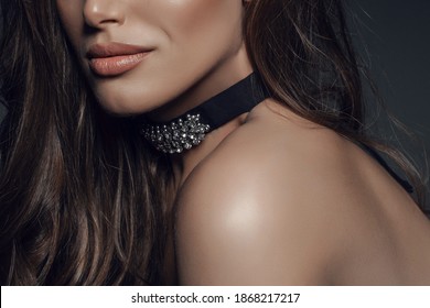 Beautiful Lips Of A Young Girl Close-up, With A Beautiful Choker On Her Neck