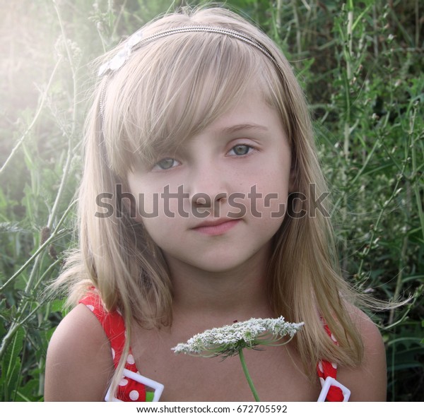 Beautiful Little Blonde Hair Girl Has Stock Photo Edit Now 672705592