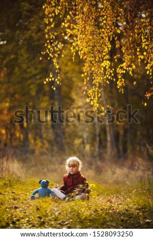 Similar – Foto Bild fröhlich lustiges Kind Mädchen isst frischen Apfel im Herbst