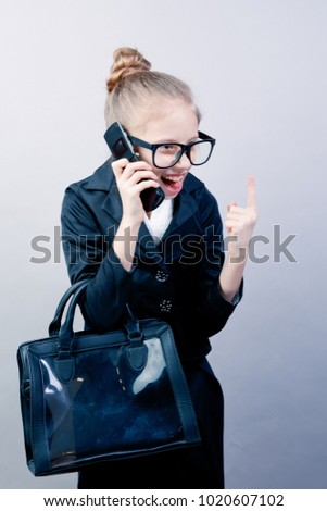 Beautiful Little Business Woman in glasses