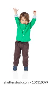 Beautiful little child, 2 years old boy, with hands up in the air, wearing shirt and jeans. High resolution image isolated on white background with copy space. Studio shot.