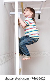 Beautiful Little Child Is Climbing Sport Ladder