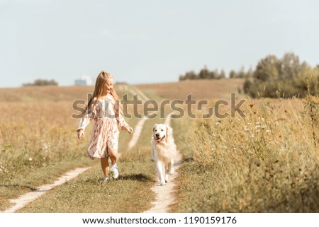 Similar – Attractive smiling blond woman with her two dogs