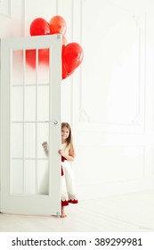 beautiful little girl with balloons