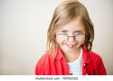 Beautiful Little Girl Glasses Showing Tongue Stock Photo 769502326 ...