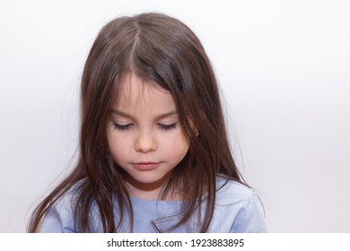 Beautiful little girl with long hair and eyelashes