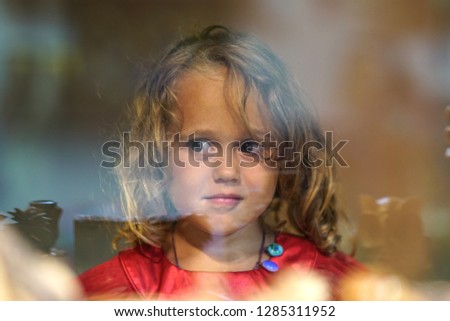 Similar – Image, Stock Photo Adorable little girl combed with pigtails